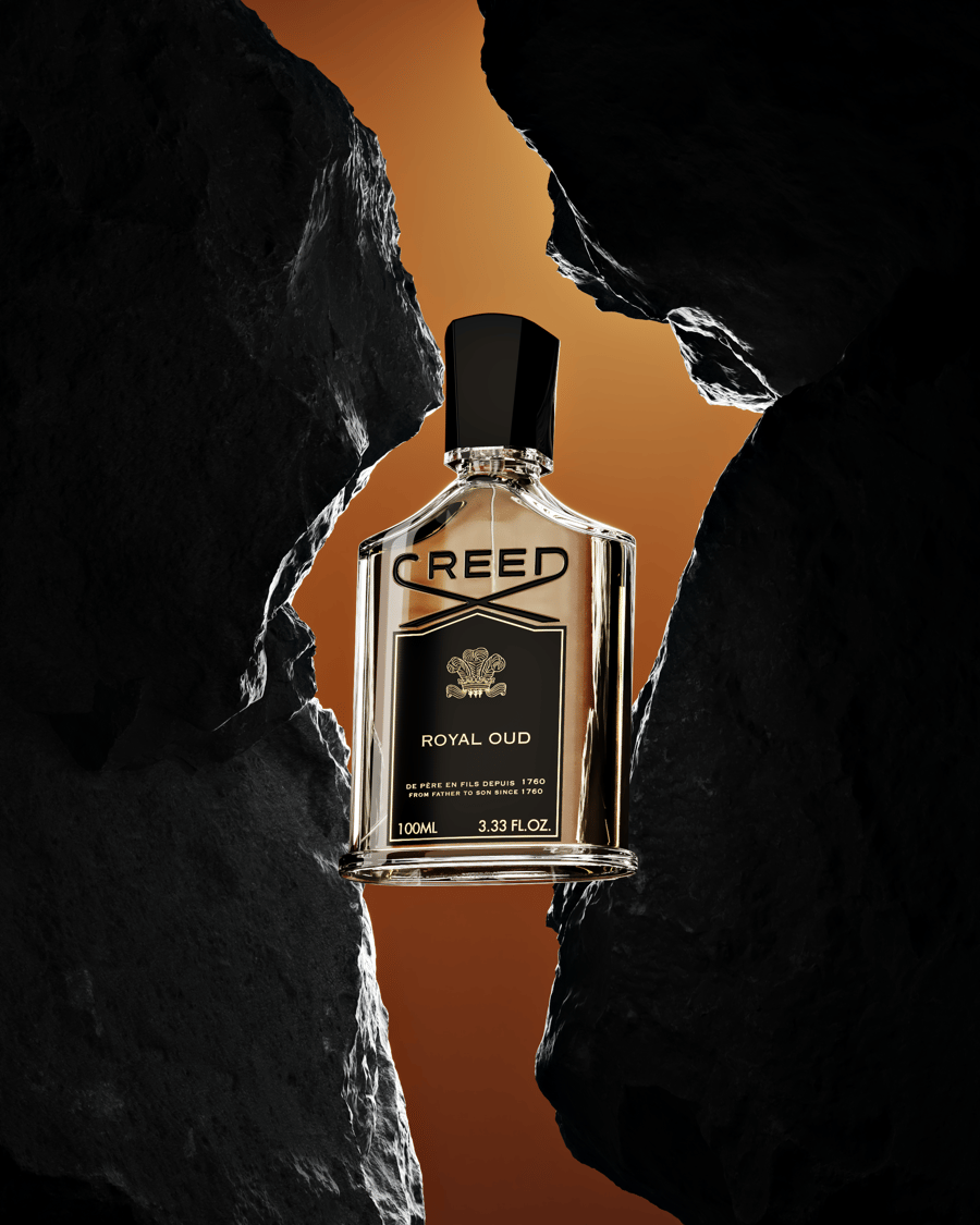 Creed Royal Oud Brown Full Shot Between Rocks